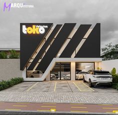 two cars parked in front of a building with stairs leading up to the top floor