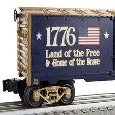 a toy train with an american flag painted on it's side and the words land of the free and home of the brave