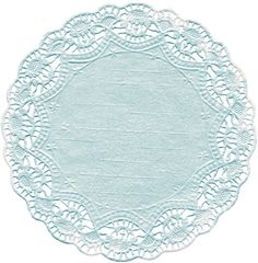 a light green doily with an intricate design on the center and bottom, set against a white background