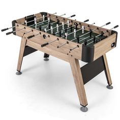 an image of a foosball table that is made out of wood