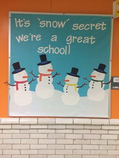 there is a sign that says it's snow secret we're a great school