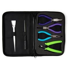 a black case with scissors and other tools inside