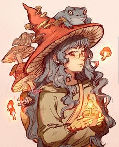 a woman in a witches hat holding a lit candle