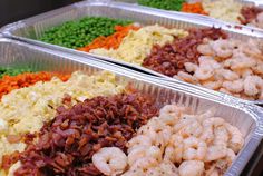 plastic containers filled with different types of food