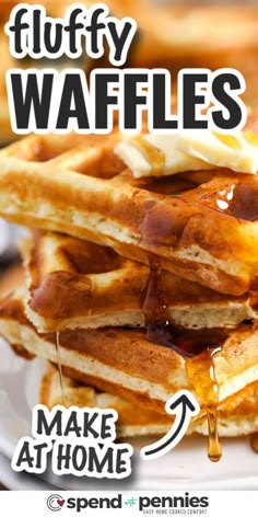 a stack of fluffy waffles with syrup on top