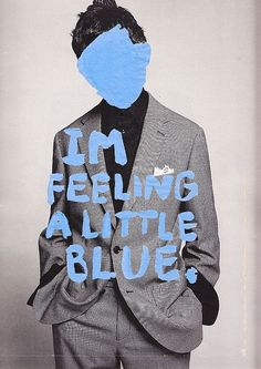 a man in a suit and tie with the words i'm feeling a little blue on his face