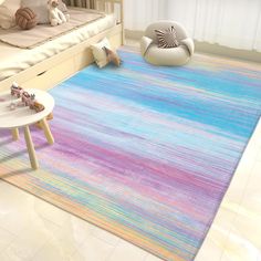 a child's room with a colorful rug on the floor