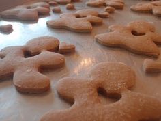 some cookies are lined up and ready to be baked