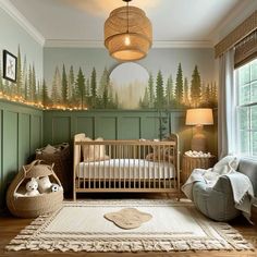 a baby's room decorated in green and white