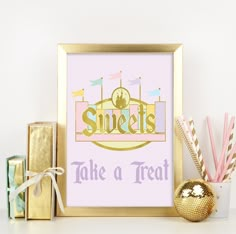 a pink and gold framed poster with sweets on it