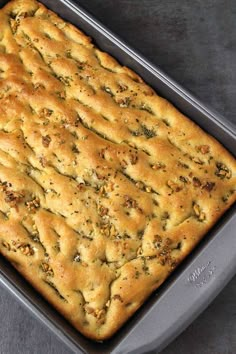 a loaf of bread sitting on top of a pan