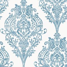 a blue and white wallpaper with an ornate design