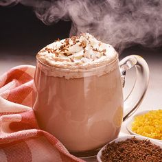 hot chocolate drink with whipped cream and spices