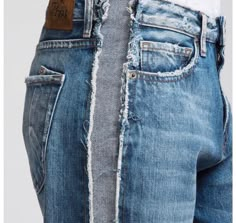 the back of a man's jeans that has been torn off and is shown