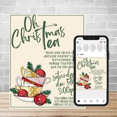 an old christmas tea ad on a phone next to a card with the message,