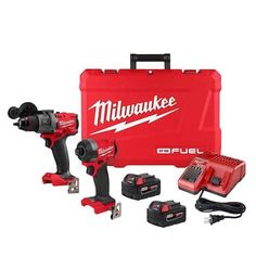 the milwaukee power tools set includes two drillers, one impactor and 2 batteries