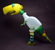 a plastic bottle that is shaped like a dinosaur