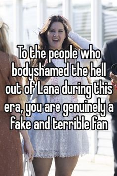 a woman walking down the street with her hand on her head and text that reads, to the people who body shame the hell out of lana during this era