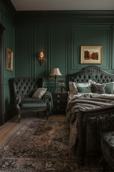 a bedroom with green walls and an antique style bed in the middle, along with two chairs