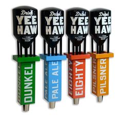 four different types of beer ketchup dispensers with words on them