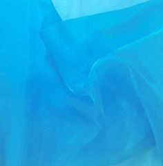 "Crystal Organza fabric is 59/60\" wide, available in an assortment of beautiful colors and sold by the yard. This fabric is frequently used for event decorations, apparel and other crafts projects. Our competitively priced organza fabric is available in bulk to fulfill orders of any size. This Fabric is 59/60\" in width. Each order comes in 1 full length piece. For example, if you order a quantity of 5, you will receive a 5 yard piece measuring 59/60\" x 180''. If you order a quantity of 15, yo Fashion Crafts, Turquoise Crystal, Organza Fabric, Polyester Dress, Sparkling Crystal, Fabric Shop, Sheer Fabrics, Etsy Crafts, Fabric Samples