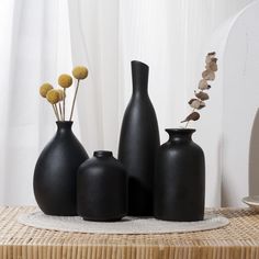 PRICES MAY VARY. 【Product Advantages】Classic, fashionable, popular and beautiful style, this set of 4 vases made of high quality pure ceramic with smooth surface matte finish effect, very textured and it won't hurt your hands like the rough vase surface.(Please confirm if the product Size meets your before purchasing) 【Quality&Detail】Ceramic vase set with breakage resistant packaging. Simple and stylish appearance, the mouth of the vase is cut smoothly, the lines are streamlined and rounded, ext Shelf Office Decor, Matte Vases, Decorations For Table, Black Ceramic Vase, Shelf Office, Table Decor Living Room, Dining Table Centerpiece, White Ceramic Vases, Table Shelf