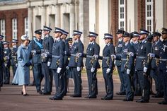 a group of men and women in uniform standing next to each other