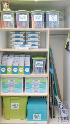 the shelves are filled with plastic containers and bins for storage, along with other items