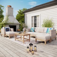 an outdoor living area with furniture and a fire place