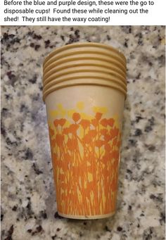 a stack of coffee cups sitting on top of a counter