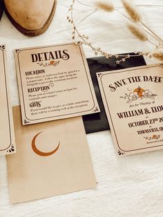 wedding stationery with save the date cards and matching shoes on a white tablecloth