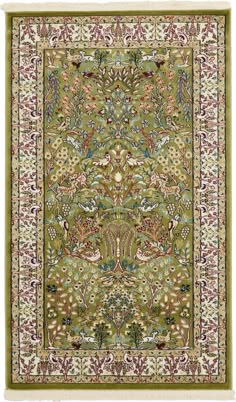 a green rug with an ornate design on the bottom and sides, in various colors