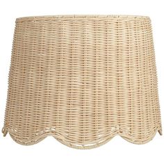 a wicker lamp shade with scalloped edges