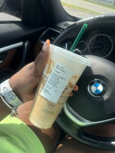 A hand holding an iced caramel coffee from Starbucks inside a car, with a view of the steering wheel and a bright green outfit in the background Best Sweet Iced Coffee Starbucks, Super Sweet Starbucks Iced Coffee, Sweet Iced Coffee Starbucks, Best Iced Coffee Starbucks Orders, Starbucks Cappuccino, Iced Coffee Starbucks, Popular Drink Recipes