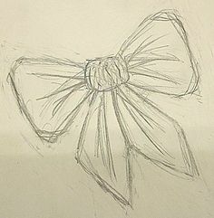 a drawing of a large bow on a piece of paper