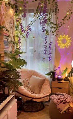 a living room filled with lots of plants next to a window covered in purple lights