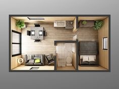 an overhead view of a living room and kitchen in a small apartment with wood flooring