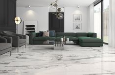 a living room with marble flooring and green couches