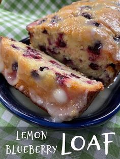 lemon blueberry loaf on a plate with the words lemon blueberry loaf above it