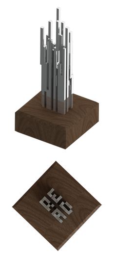 two pieces of wood and metal on top of each other, one with an abstract design