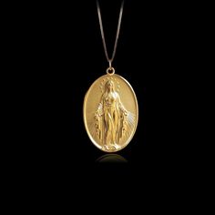 Carry a message of love and compassion with our Virgin Mary pendant, symbolizing the gentle strength and warmth of divine care. This pendant beautifully enhances any look with a touch of spirituality. 𝗣𝗲𝗻𝗱𝗮𝗻𝘁 𝗱𝗲𝘁𝗮𝗶𝗹𝘀 This pendant is crafted in real solid gold. * Made in USA * 𝗛𝗲𝗶𝗴𝗵𝘁: 1.28" (32.5 mm) x 𝗪𝗶𝗱𝘁𝗵: 0.8" (21 mm)  *not including the bail dimensions * 𝗠𝗮𝘁𝗲𝗿𝗶𝗮𝗹: 14K and 18K solid gold * 𝗙𝗶𝗻𝗶𝘀𝗵: polished * 𝗪𝗲𝗶𝗴𝗵𝘁: Approximately 6 grams  * 𝗕𝗮𝗶? Virgin Mary Pendant, Virgin Mary Necklace, Phoenix Pendant, Message Of Love, Love And Compassion, Solid Gold Chains, Mini Pendants, Miraculous Medal, Box Making