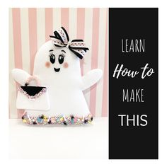 a white stuffed animal with a black bow on it's head and the words learn how to make this