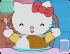 an animated hello kitty is eating some food