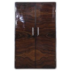 a large wooden cabinet with two doors on the front and one door open to show it's wood grain pattern