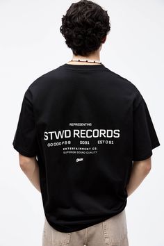 Short sleeve T-shirt with contrast STWD Records detailing and a round neck. Available in assorted colours and made of cotton. Streetwear T-shirt With Front Logo, Simple Shirt Design, Short Sleeve T-shirt With Text Print For Streetwear, Shirt Reference, Black Urban Streetwear T-shirt, Black Text Print T-shirt For Streetwear, Black Urban T-shirt With Logo, Shirt Sticker