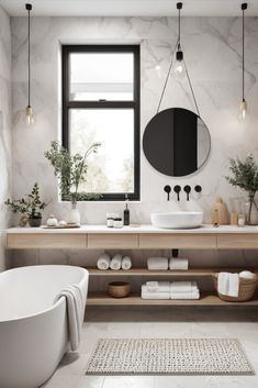 a bathroom with marble walls and flooring, two sinks, a bathtub and a round mirror