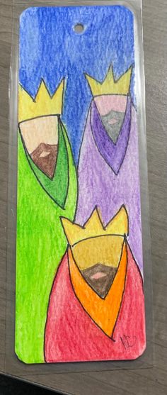 a drawing of two people with crowns on their heads