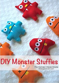 several different colored stuffed animals sitting on top of a white sheet with the words diy monster stuffies