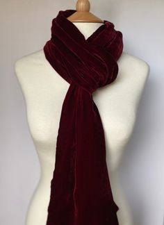 Luxurious and incredible Burgundy silk velvet scarf. This scarf is extremely versatile; ideal for wrapping up in the cold weather and offers a touch of glamour to any outfit, whether it be casual or for a special occasion.  This will be perfect as a gift or a treat for yourself.  Composition: 60% Silk and 40%Viscose Unisex Christmas Gifts, Velvet Scarf, Cowl Scarf, Long Red, Warm Scarf, Purple Velvet, Silk Velvet, Crushed Velvet, Neck Scarves