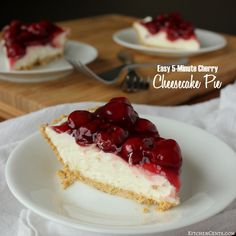 a piece of cheesecake with cherries on top